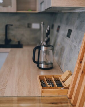Family Villa, Balcony | Private kitchen | Full-sized fridge, microwave, stovetop, cookware/dishes/utensils - Misteph Luxury Living (Kigali)