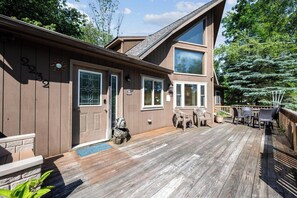 A two-story house with a deck, a mailbox, and a mailbox number. - Bearitage Chalet Family Poconos Retreat in The Hideout Lake Pool Ski (The Hideout)