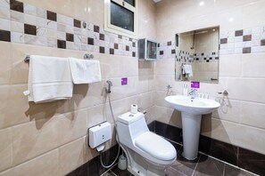 Hair dryer, slippers, towels, soap