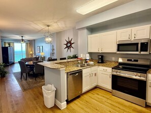 Fridge, microwave, oven, stovetop - Gulf-Front w/ Balcony Views & Family Comfort Free Golf & Activities Daily! (Panama City Beach)