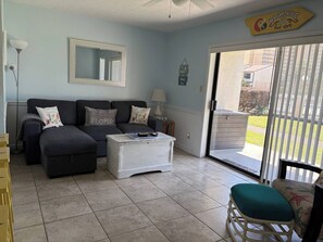 Living area - Welcome to Margaritaville, Where it’s always 5 o’clock! Steps from the beach! (Panama City Beach)
