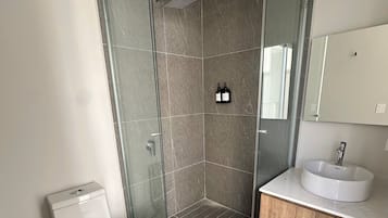 Shower, towels, soap, shampoo