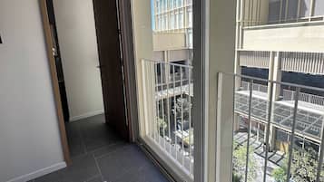 Studio Suite, City View | Hypo-allergenic bedding, laptop workspace, free WiFi, bed sheets