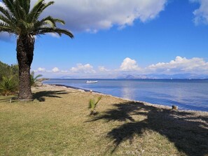 On the beach, sun loungers