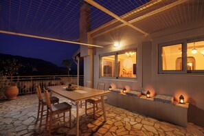 Outdoor dining - Charming private villa in Kato Korakiana, Corfu, quiet green area with sea view. (Kato Korakiana)