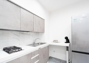 Appartamento Deluxe, balcone, vista città | Cucina privata
