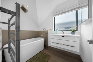 Hair dryer, towels, soap, shampoo
