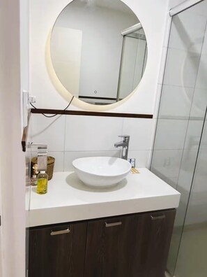 Hair dryer, towels, soap, toilet paper