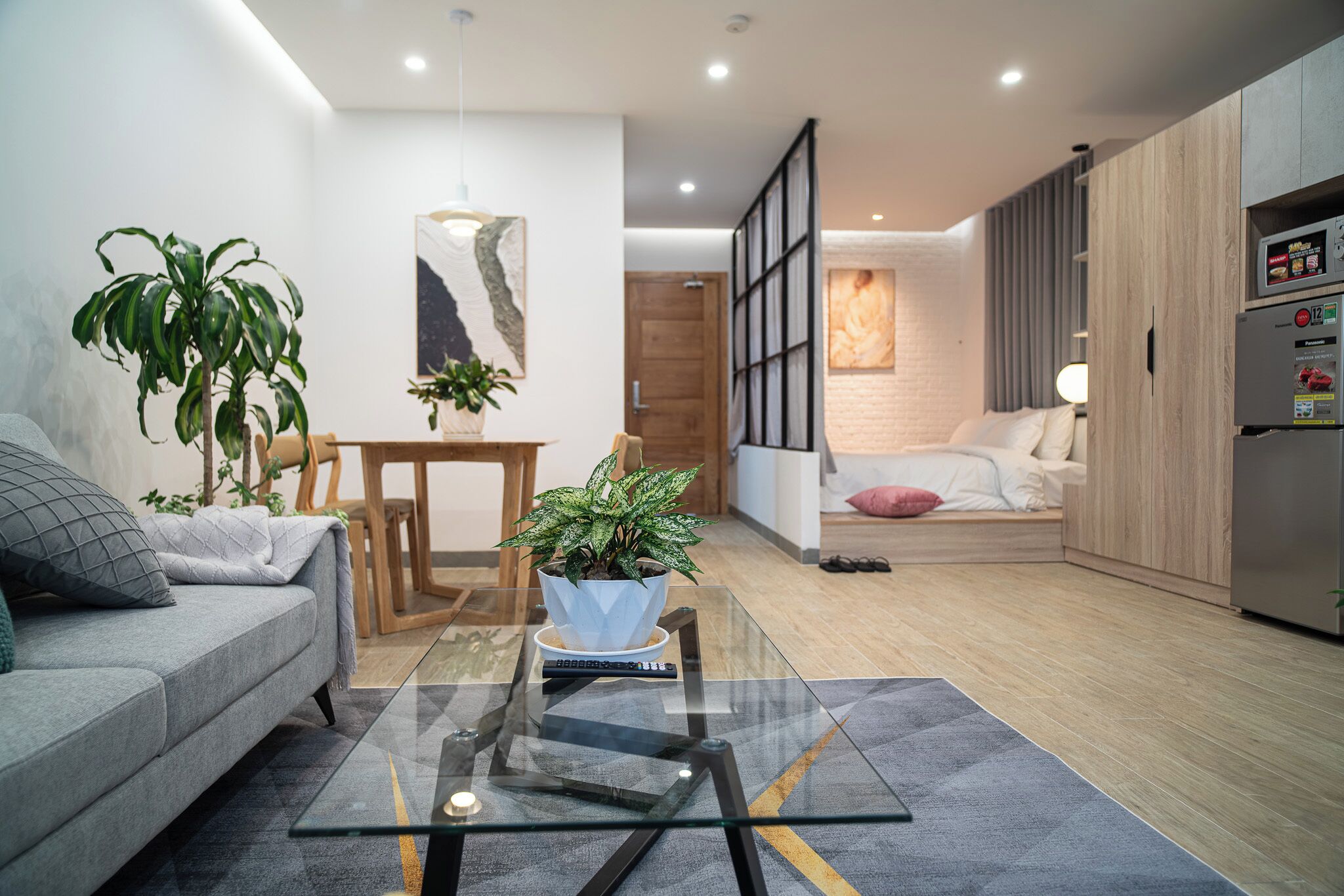 Luxury Studio Suite, Garden View | Desk, blackout curtains, soundproofing, iron/ironing board