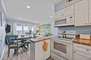 Fridge, microwave, oven, stovetop - Skytide | Oceanfront Balcony + Pool & Beach Access (North Topsail Beach)