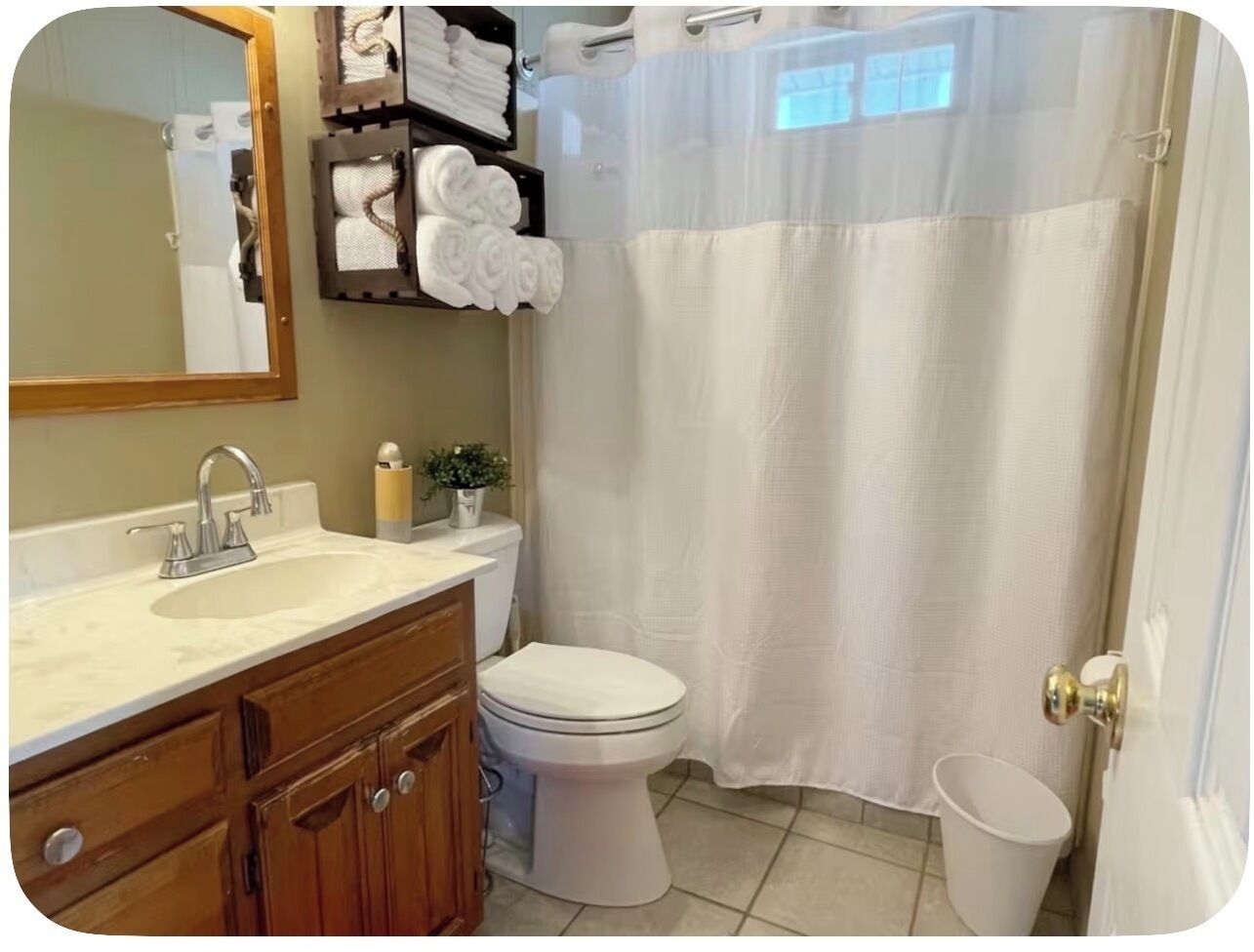 Shower, hair dryer, towels, toilet paper
