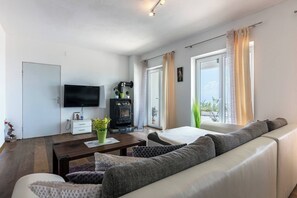 Apartment, 1 Bedroom, Accessible, Smoking | Living room | Books - Apartment With Heated Pool Jacuzzi sea View (Lovran)