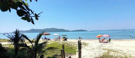 Apartment, Balcony, Partial Sea View | Beach | On the beach, white sand, beach umbrellas