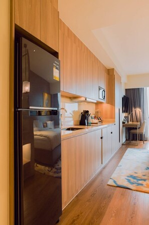 Fridge, microwave, oven, stovetop - Riverfront Garden Retreat at Acqua (Mandaluyong City)