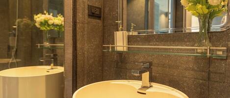 Hair dryer, bidet, towels, soap