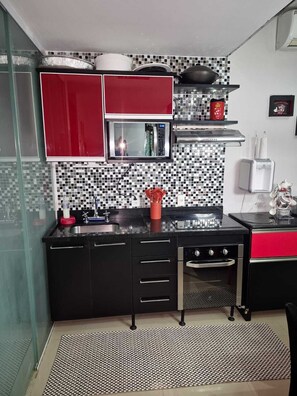 Private kitchen - Apartment in a resort-style condominium in Guarujá - Enseada (Guarujá)