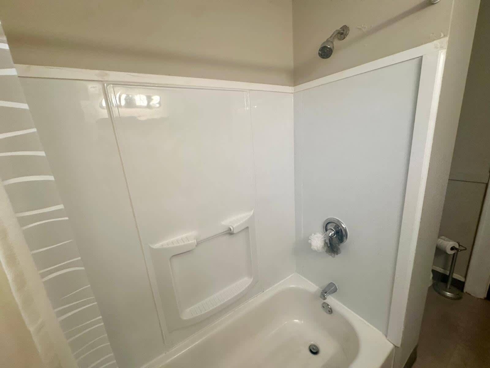 Shower, hair dryer, towels, shampoo