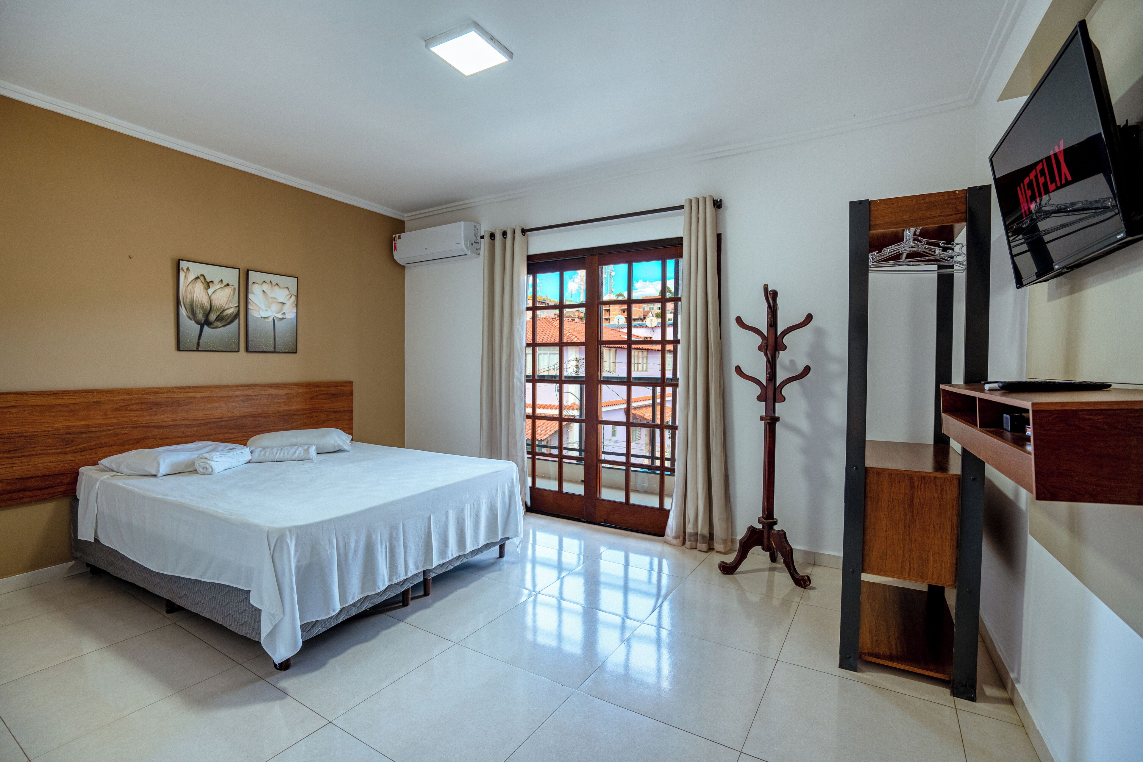 Appartement Confort, véranda, vue ville | Équipements de la chambre