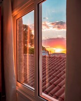 Apartamento conforto, ar-condicionado, vista para a cidade | Vista do quarto