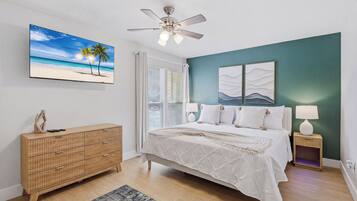 1 bedroom, desk, iron/ironing board, travel crib