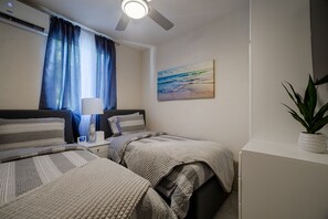 2 bedrooms, iron/ironing board, WiFi, bed sheets - Cozy St. James Beach Villa – Steps from the Ocean. (Fitts Village)