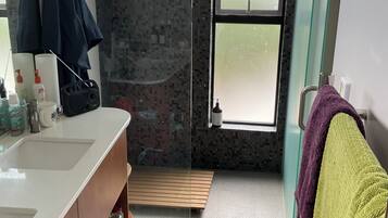 Shower, hair dryer, towels, soap