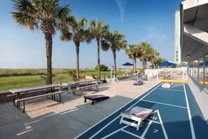 Outdoor dining - 2-bedroom condo in tranquil North Myrtle Beach with AC and gym (North Myrtle Beach)