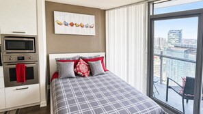 Suite monolocale Basic, 1 letto queen, non fumatori, bagno privato | Area soggiorno