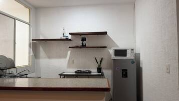 Casa, 2 quartos, varanda | Cozinha privada