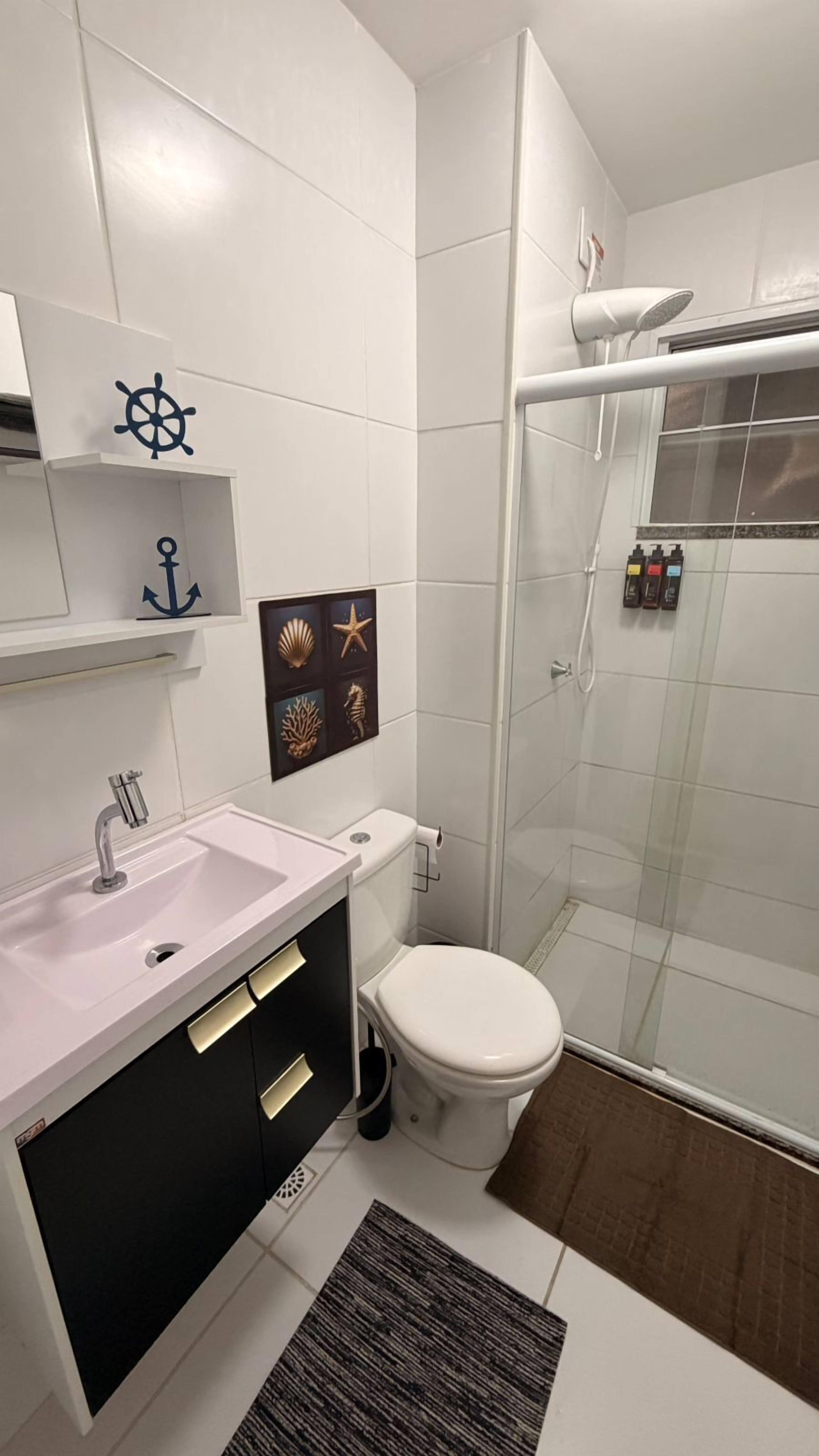 Hair dryer, towels, soap, toilet paper
