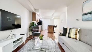 Honeymoon Suite, 1 Bedroom | Living area | 50-inch flat-screen TV with digital channels
