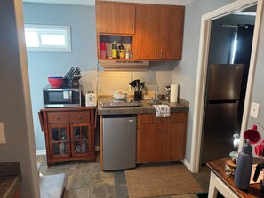 Fridge, microwave, stovetop, coffee/tea maker