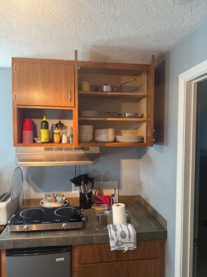 Fridge, microwave, stovetop, coffee/tea maker