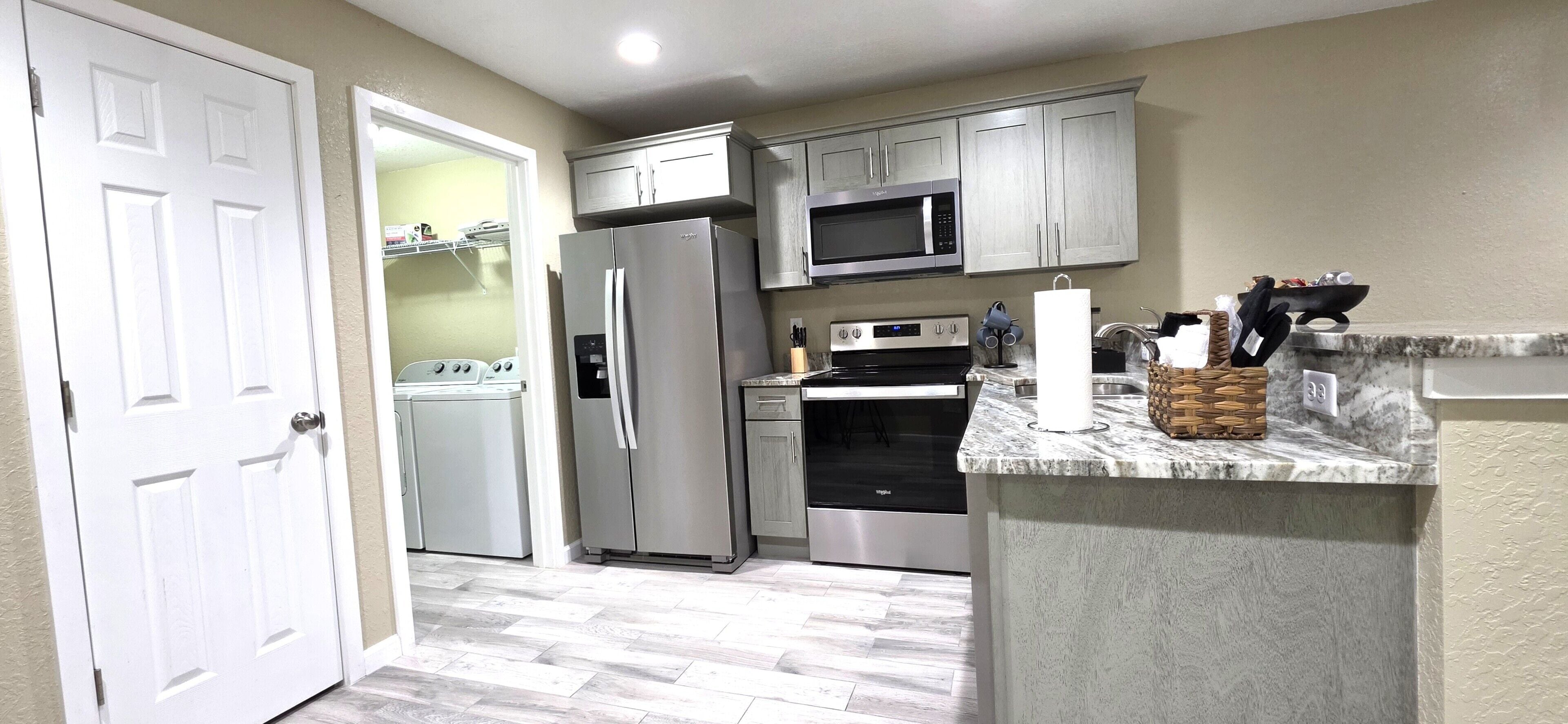 Microwave, stovetop, dishwasher, coffee/tea maker