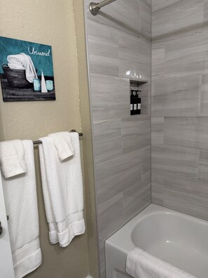 Hair dryer, towels, soap, shampoo