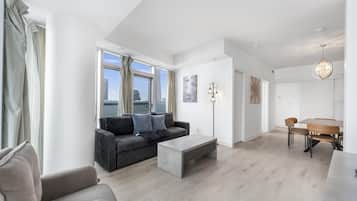 Premier Room | Living area | 50-inch flat-screen TV with digital channels