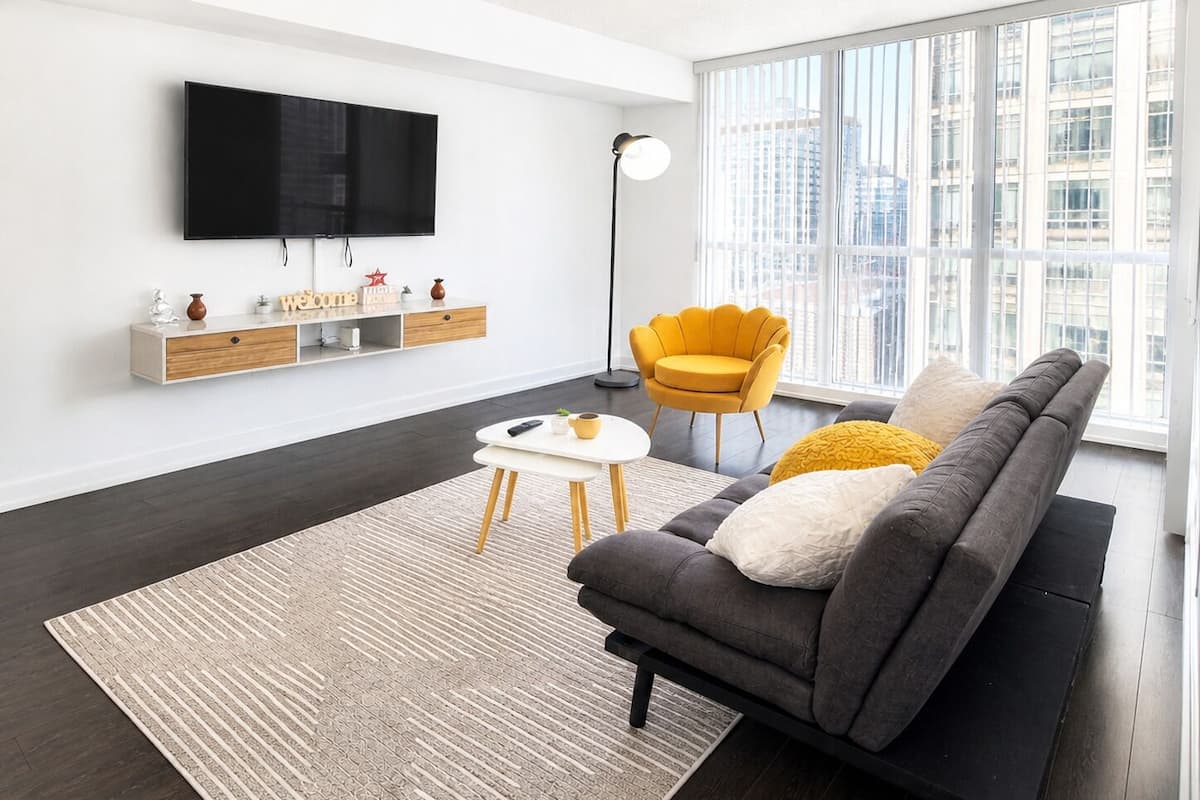 Deluxe-Suite, Mehrere Betten, eigenes Bad, Stadtblick | Wohnbereich