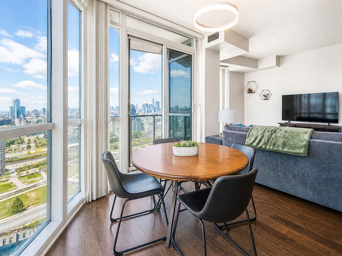 Family Suite, 2 Bedrooms, City View | Living area | 50-inch flat-screen TV with digital channels