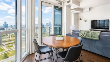 Family Suite, 2 Bedrooms, City View | Living area | 50-inch flat-screen TV with digital channels