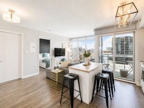 Executive Suite, 1 Queen Bed with Sofa bed, City View | Private kitchen | Fridge, microwave, oven, stovetop