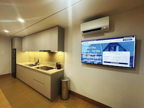Family Double Room, Multiple Beds, Balcony, Mountain View | Private kitchen | Full-size fridge, stovetop, cookware/dishes/utensils - S Hotel Nha Trang (Nha Trang)