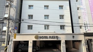 A multi-story hotel with a sign reading 'HOTEL FLEX9.' - Flex9 (Uijeongbu)