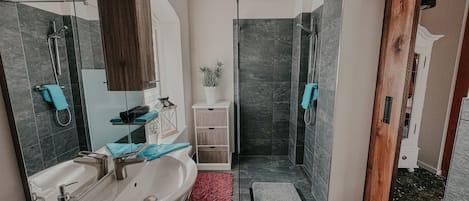 Shower, towels, toilet paper