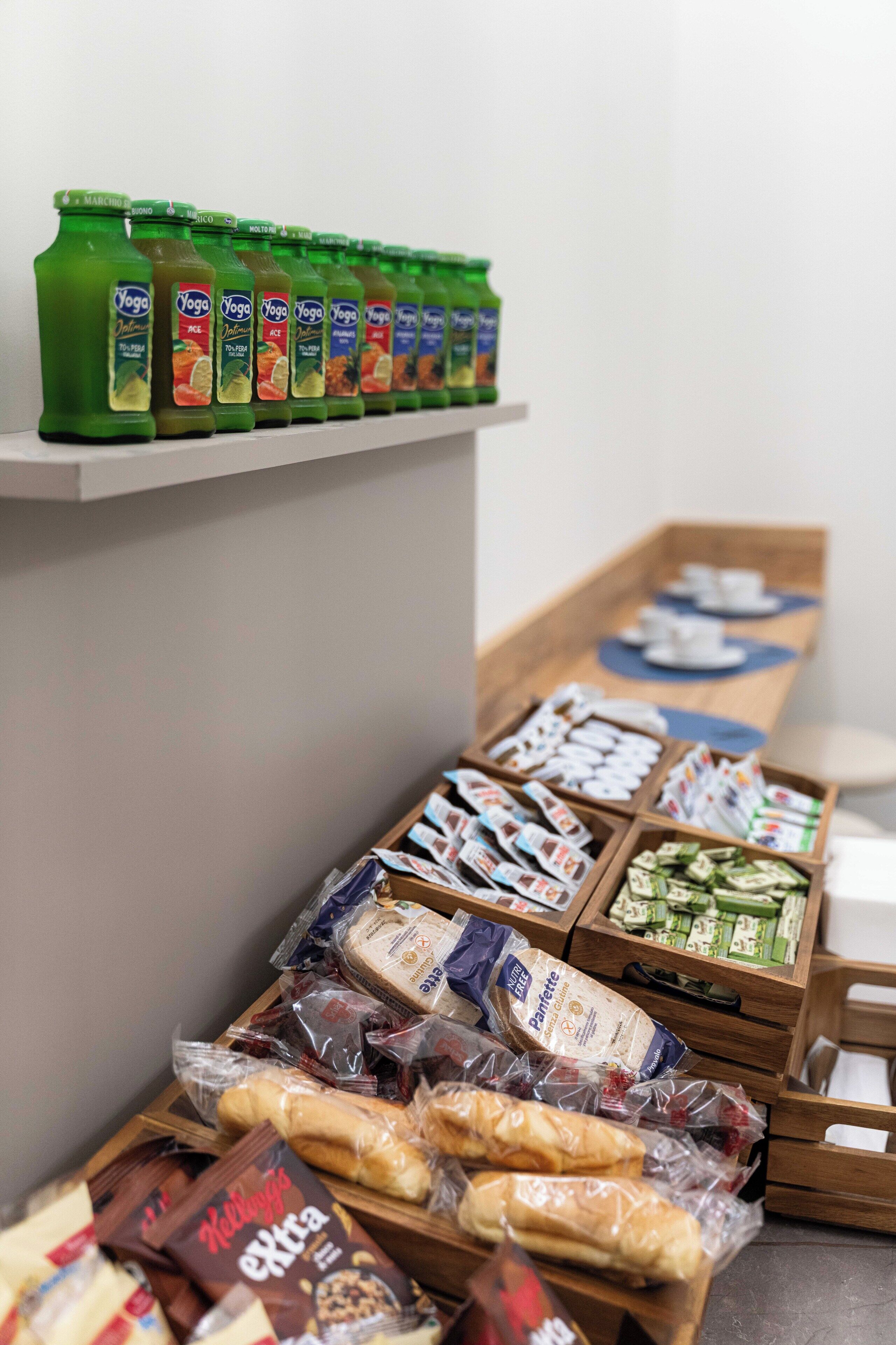 A snack bar with various packaged foods and beverages.