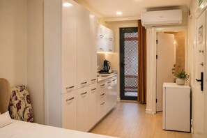 Premium bedding, minibar, desk, laptop workspace