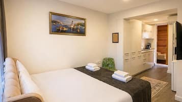 Premium bedding, minibar, desk, laptop workspace