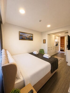 Premium bedding, minibar, desk, laptop workspace