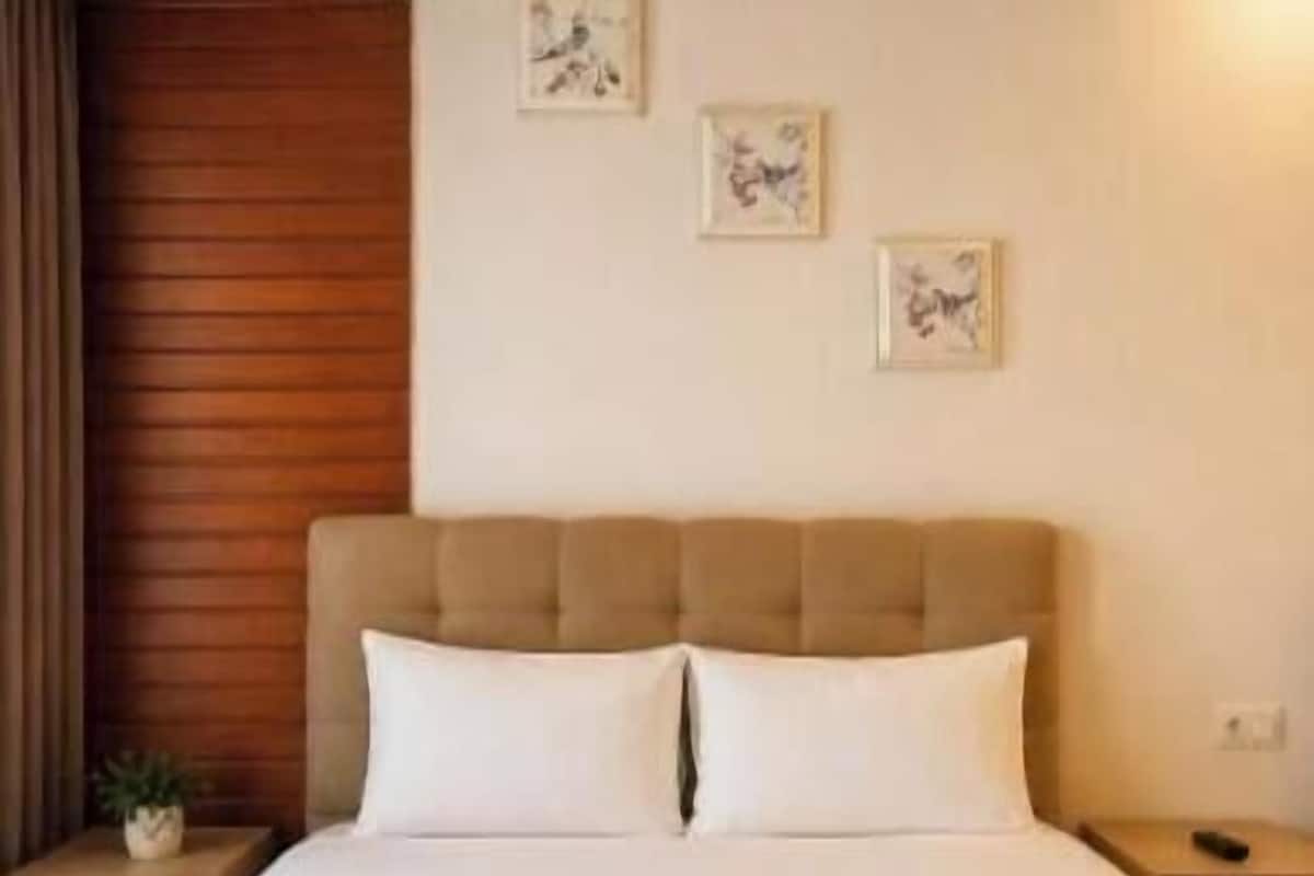 Chambre Quadruple Confort | Literie de qualité supérieure, minibar, bureau