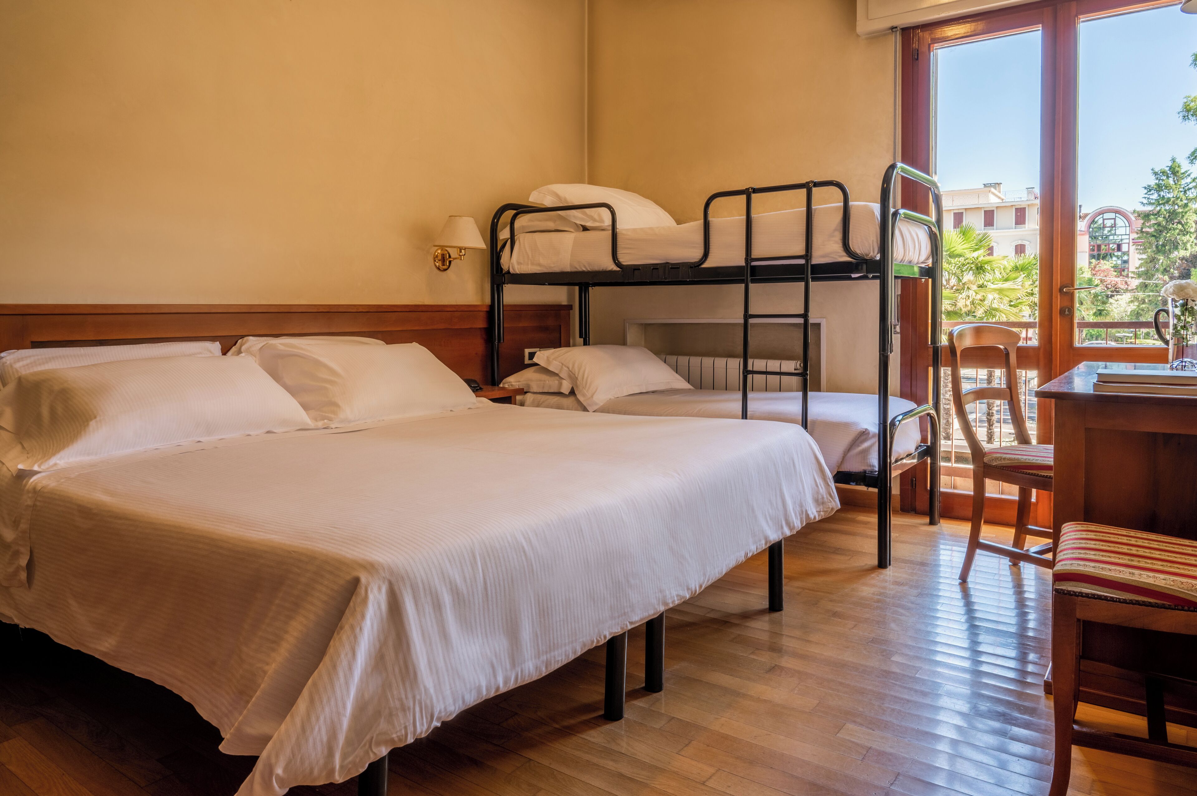 Classic Quadruple Room | In-room safe, desk, soundproofing