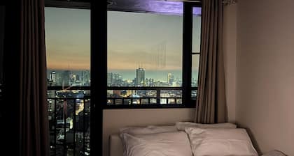 19F Stylish 1BR Air Residences | Balcony, WiFi, Netflix, City View +24/7 secure!